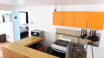 Apartment, 3 Bedrooms, Kitchenette | Private kitchen | Fridge, microwave, oven, stovetop