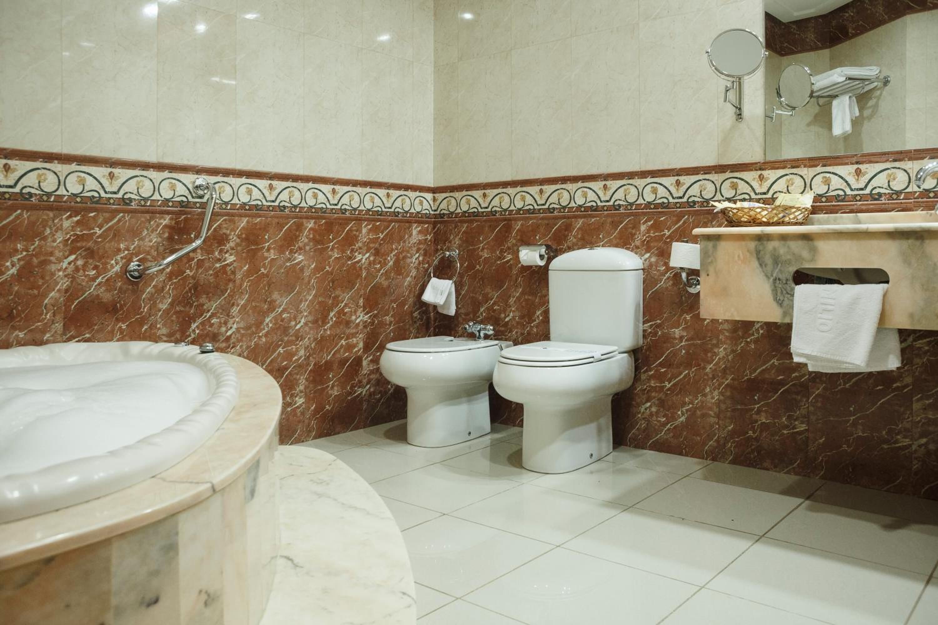 free toiletries, hair dryer, bidet, towels