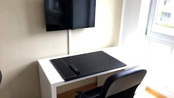 32-inch flat-screen TV with cable channels, TV