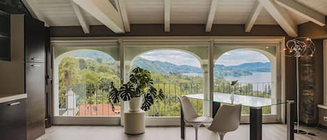 Luxury Penthouse, 1 Bedroom, Sauna, Lake View | Living area | 37-inch flat-screen TV with satellite channels, TV, Netflix