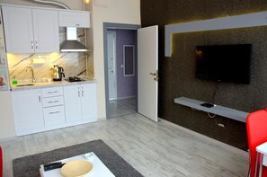 Apartment | Living area | LCD TV - Konukevim Mesrutiyet Apartment 2 (Ankara)