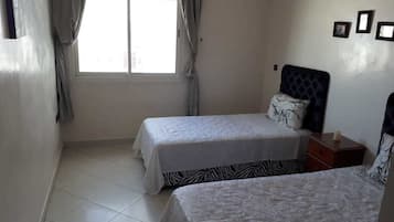 Appartement, 2 slaapkamers | 2 slaapkamers, verduisterende gordijnen, een strijkplank/strijkijzer