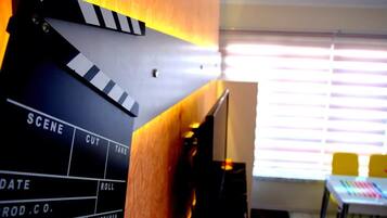 Apartment, Non Smoking | Living area | LCD TV, fireplace