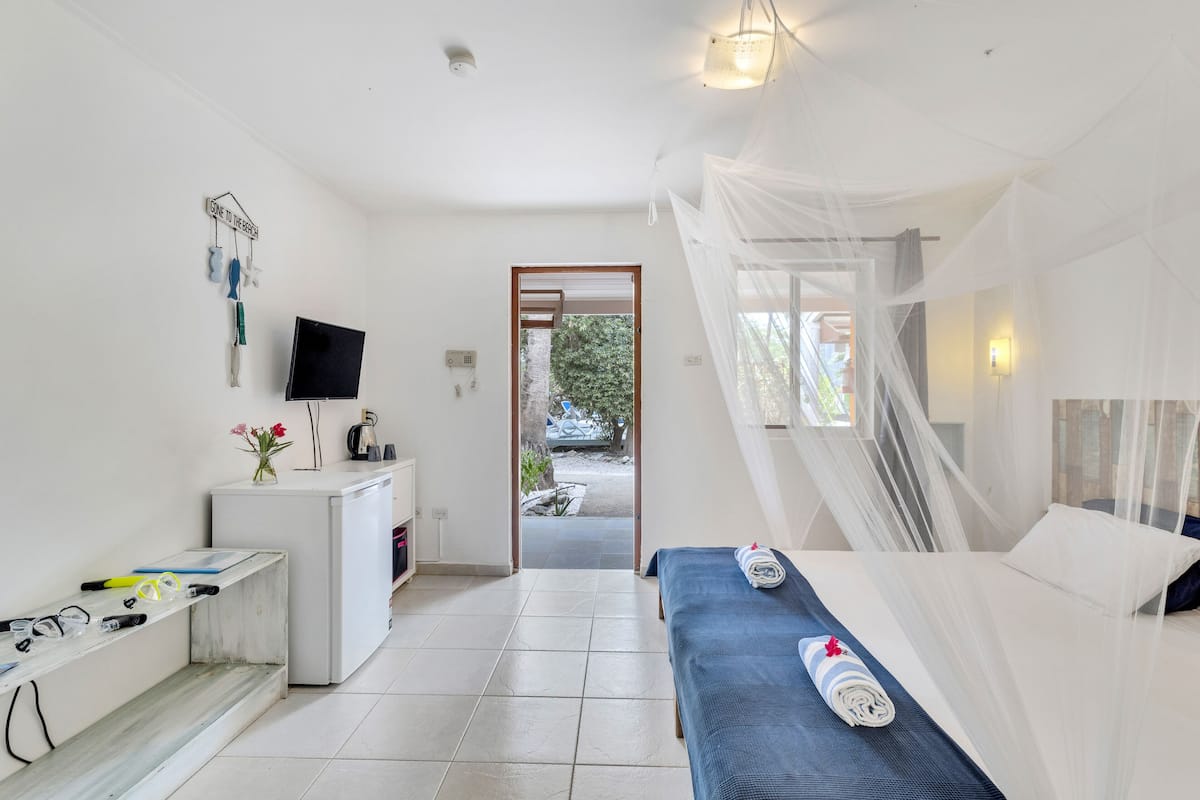 classic double room, 2 single beds, non smoking, garden view | 1 bedroom, minibar, in-room safe, individually decorated