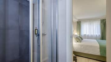 Basic Double Room, 1 Queen Bed | Bathroom | Shower, free toiletries, hair dryer, towels