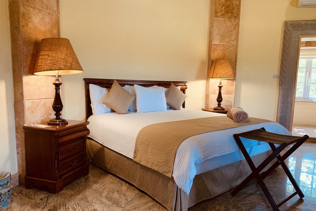 Deluxe Suite, 1 King Bed with Sofa bed, Non Smoking, Garden View | Premium bedding, down comforters, minibar, desk