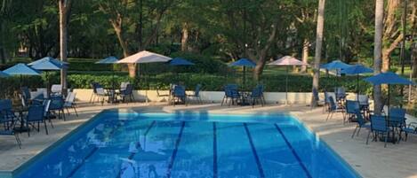 Outdoor pool, pool umbrellas, sun loungers