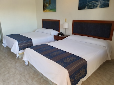 Double Room, 2 Double Beds | In-room safe, desk, blackout drapes, iron/ironing board. Hotel Lossandes