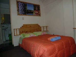 Select Comfort beds, desk, blackout curtains, iron/ironing board