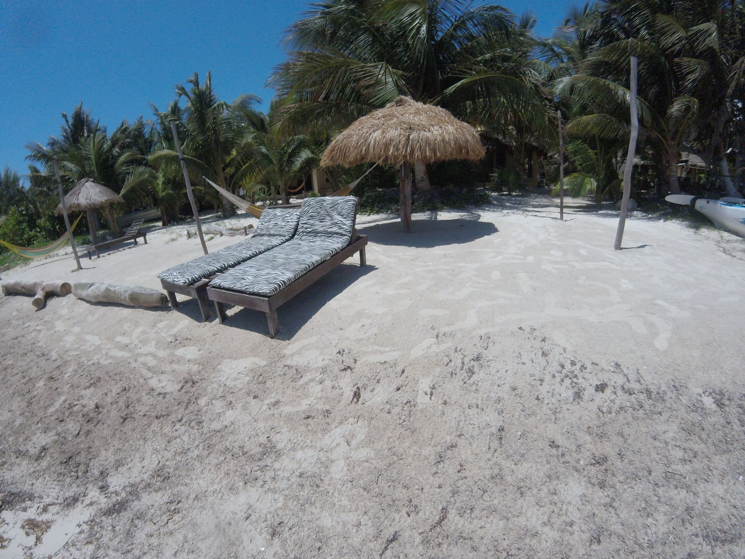 on the beach, white sand, beach massages, beach volleyball