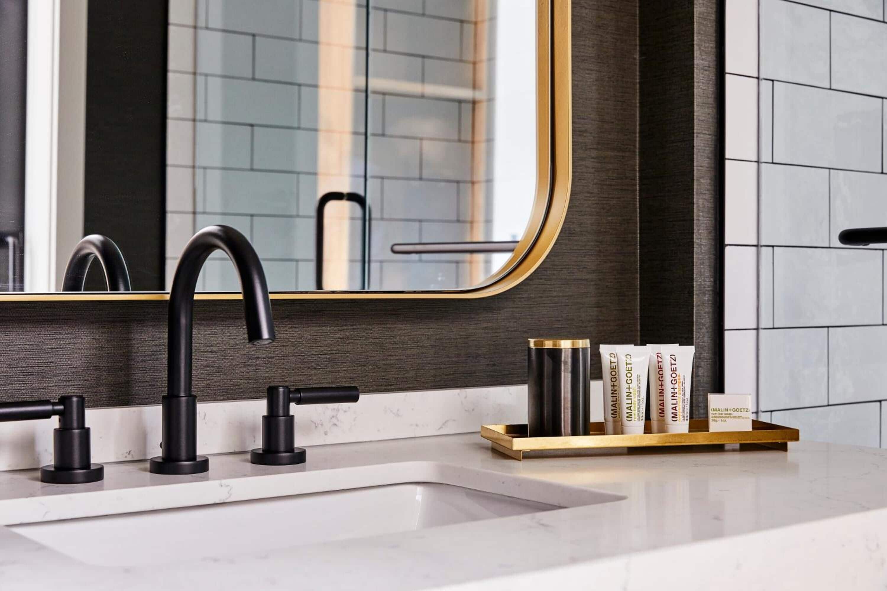 designer toiletries, hair dryer, dressing gowns, slippers