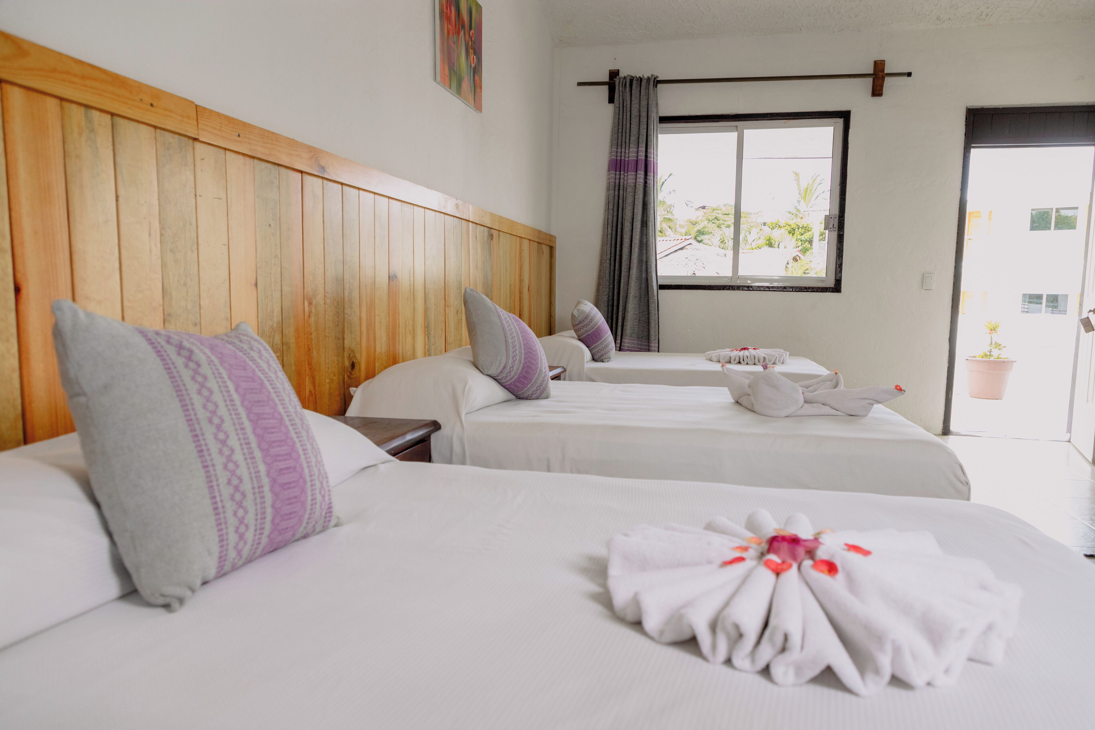 standard triple room, pool view | 1 bedroom, minibar, iron/ironing board, bed sheets