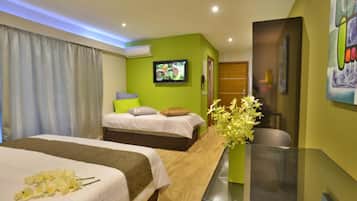 Deluxe Studio Suite, Accessible, Garden View | Living area | Flat-screen TV
