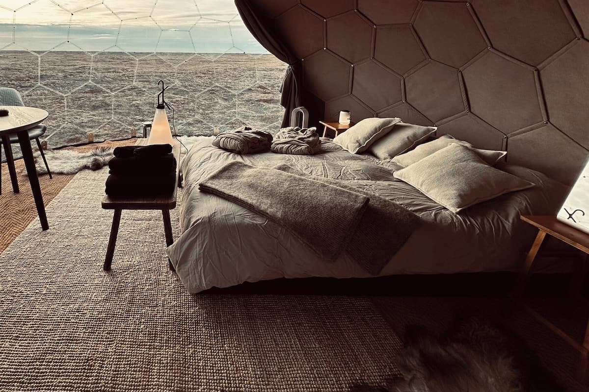 Black Beach Aurora Dome | Premium bedding, individually decorated, individually furnished