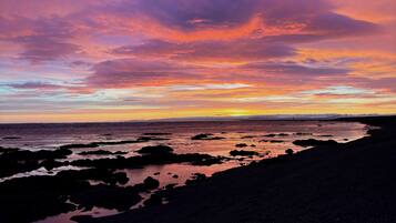 Praia particular, areia preta