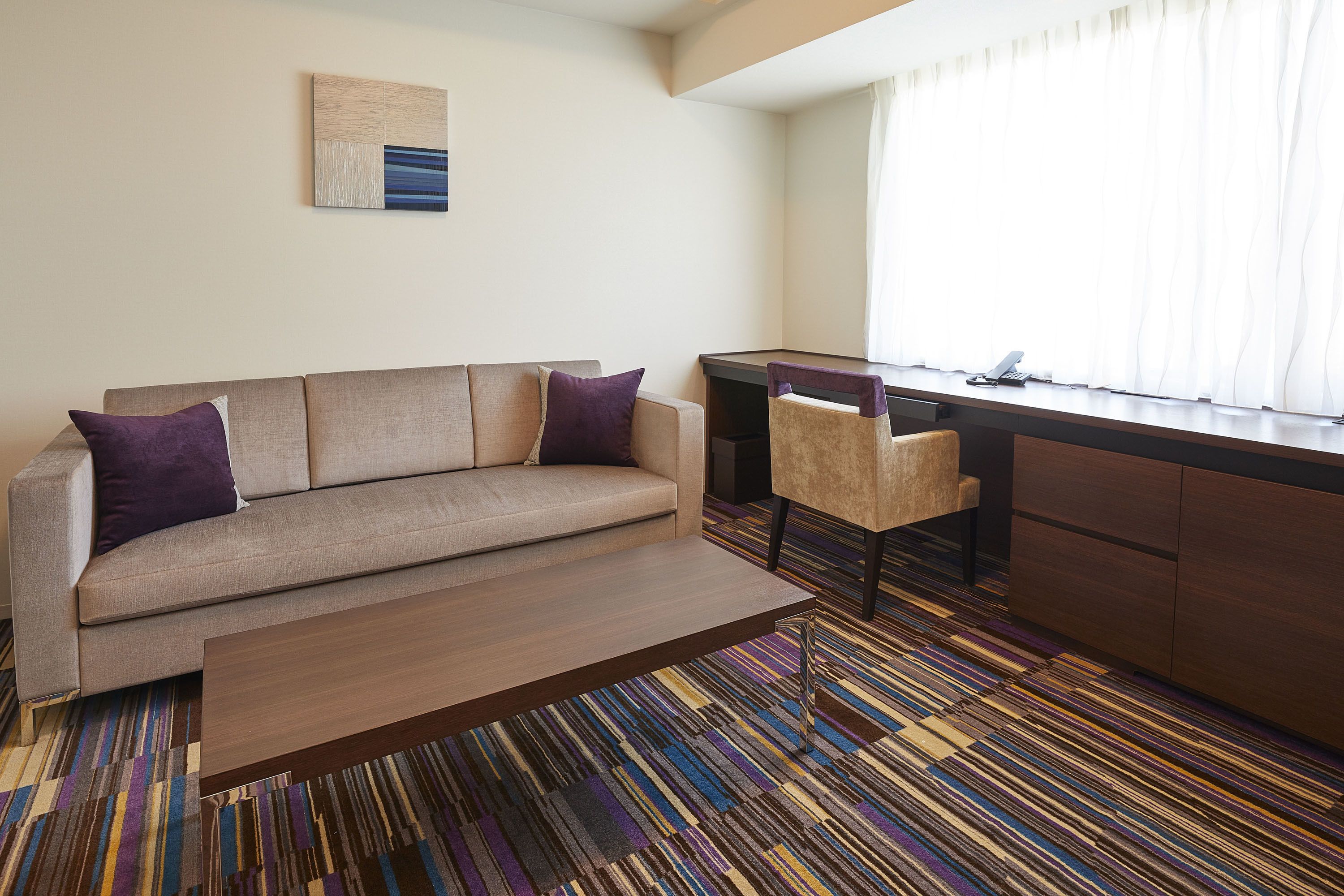 deluxe twin room | down duvets, in-room safe, desk, soundproofing