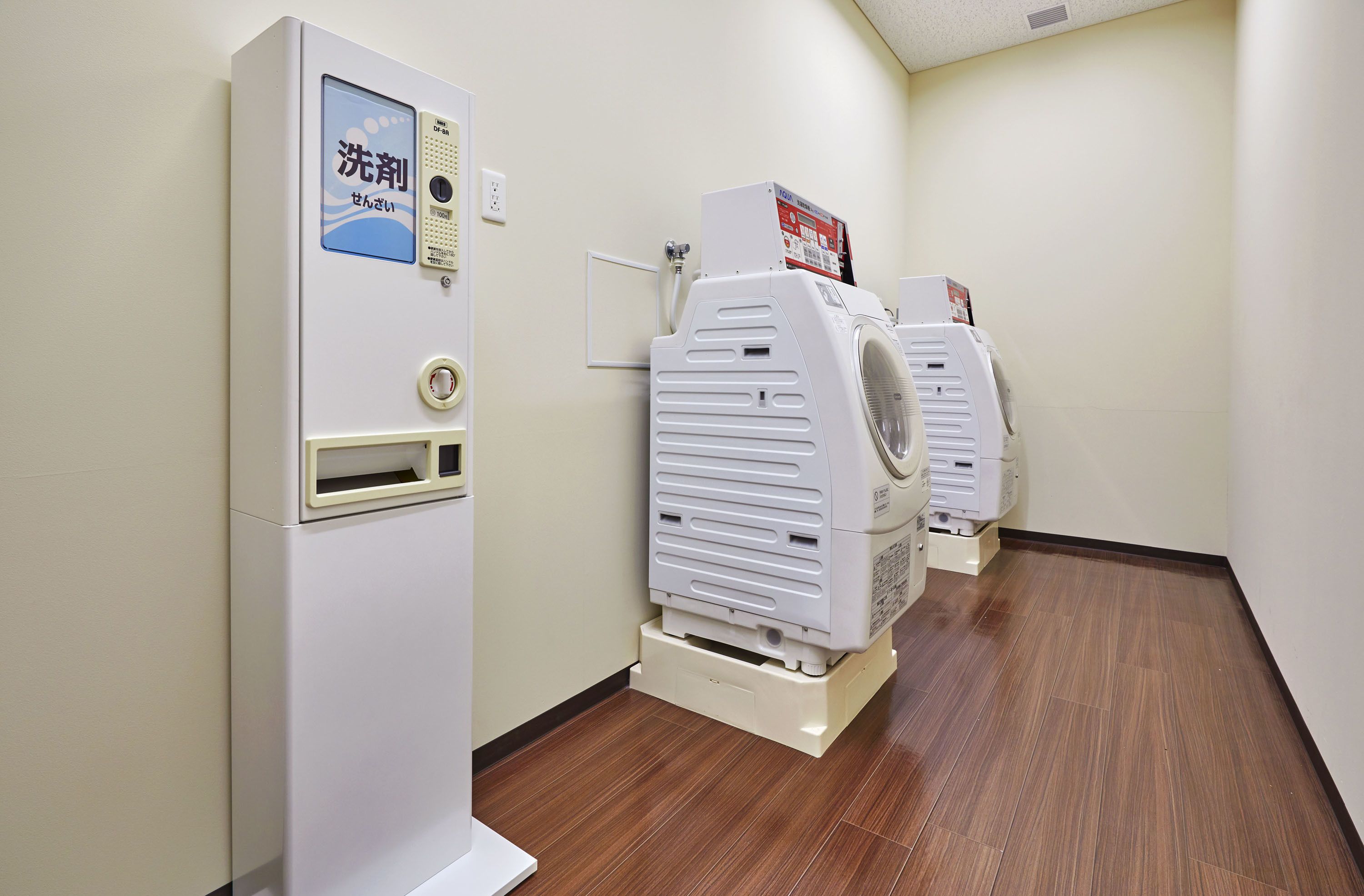 A laundry facility with a washing machine and a dryer.