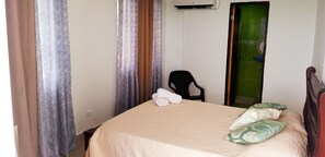 Shower, rainfall showerhead, hair dryer, towels