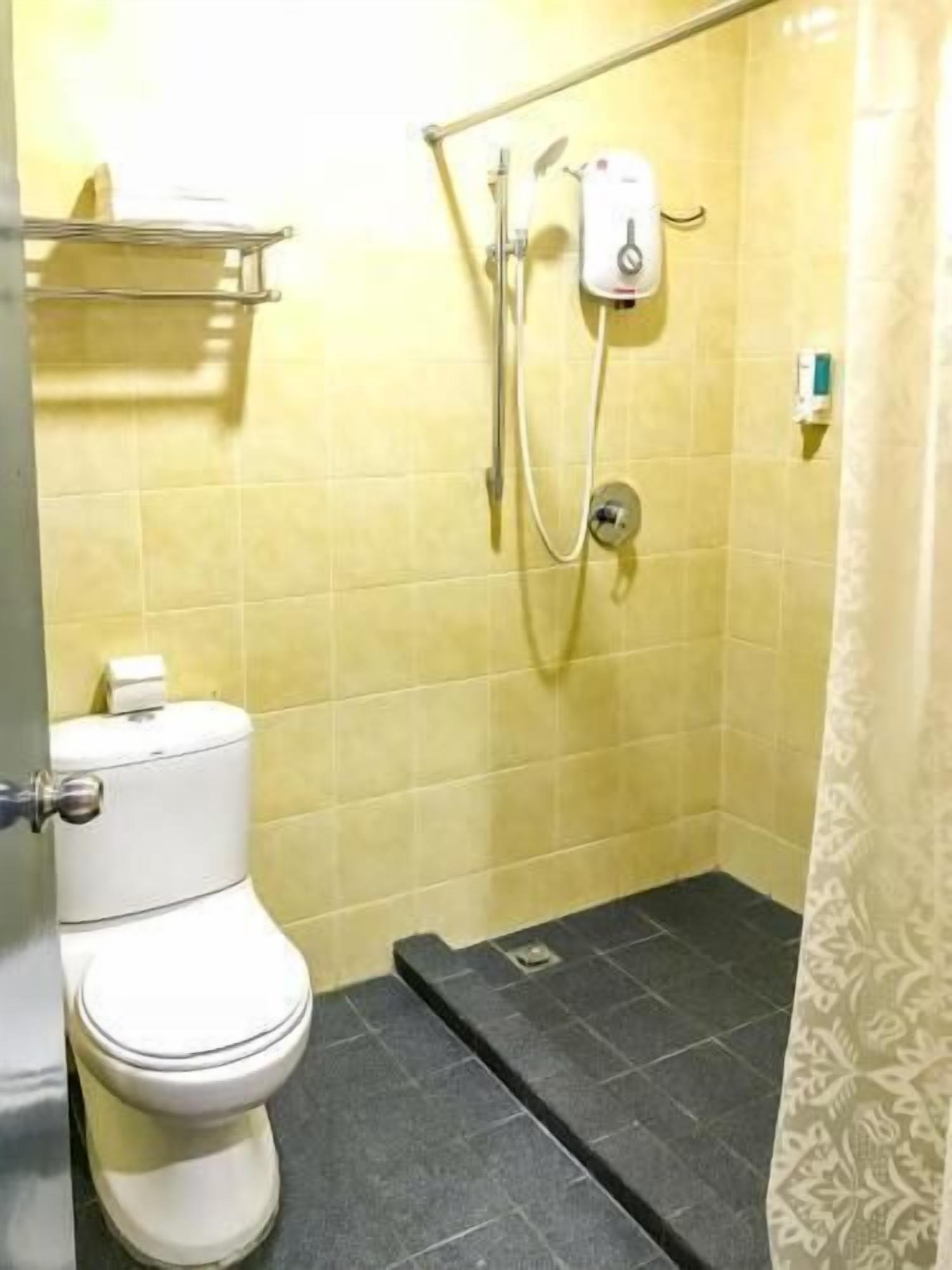 Bathroom | Shower, hair dryer, slippers, bidet