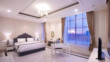 Deluxe-Doppelzimmer, 1 King-Bett, Nichtraucher (Grand) | Zimmersafe, Schreibtisch, schallisolierte Zimmer, Zustellbetten