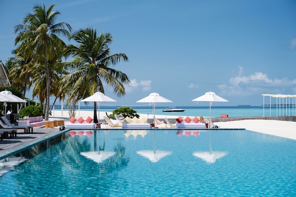 2 outdoor pools, open 10:00 AM to midnight, pool umbrellas