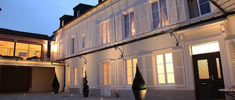 Front of property - evening/night