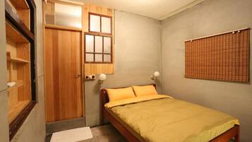 Habitación doble estándar | Cortinas blackout, wifi gratis y ropa de cama