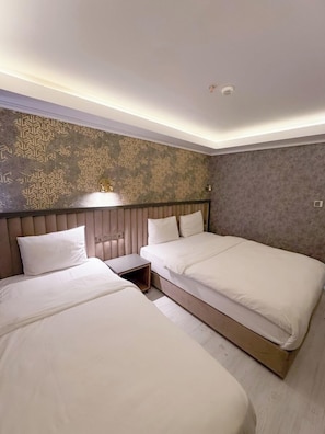 Family Triple Room, Multiple Beds, Non Smoking, City View | Premium bedding, iron/ironing board, free WiFi