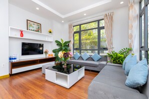Deluxe Villa, Multiple Bedrooms, Pool Access | Living area | 45-inch Smart TV with digital channels, TV, Netflix - Vihomes Villa (Ho Chi Minh City)