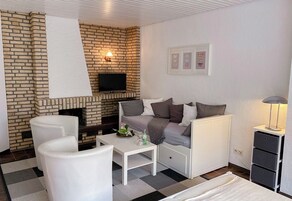 Family Quadruple Room, 1 Bedroom | Desk, iron/ironing board, free WiFi, bed sheets