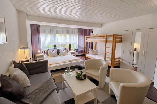 Family Quadruple Room, 1 Bedroom | Desk, iron/ironing board (on request), WiFi (free), bed sheets