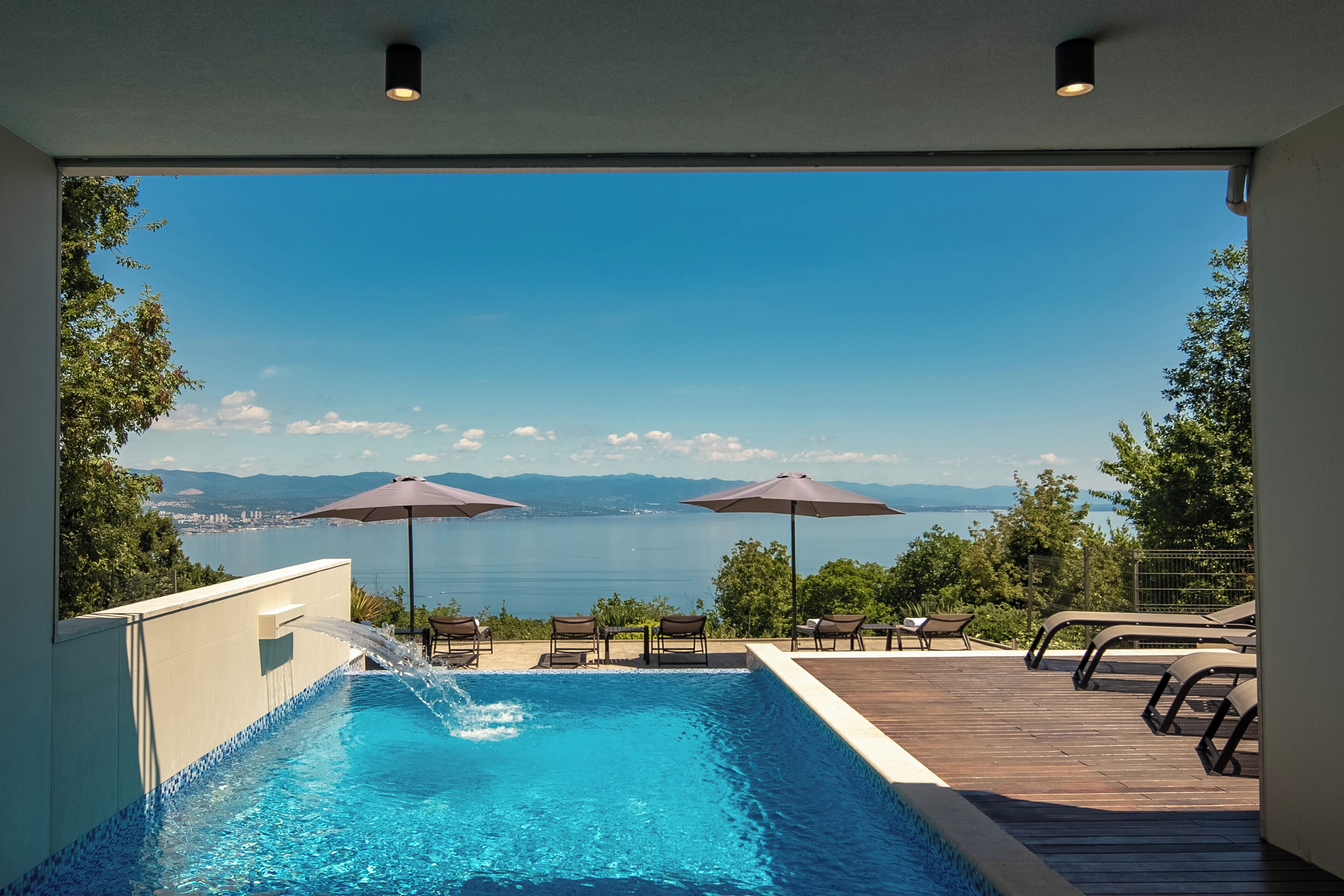 Outdoor pool, pool umbrellas, pool loungers