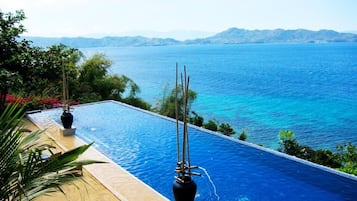 Outdoor pool, open 6:00 AM to midnight, sun loungers