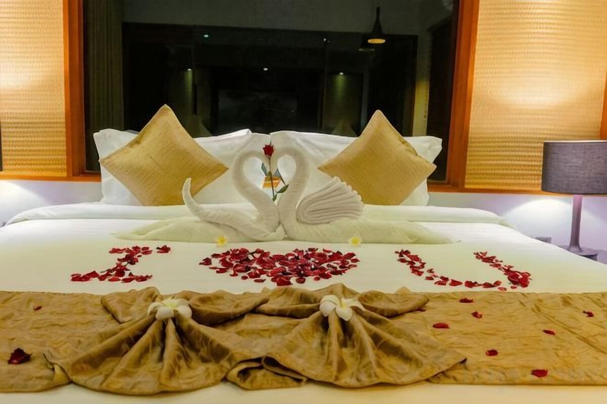 Premium bedding, down duvets, in-room safe, desk