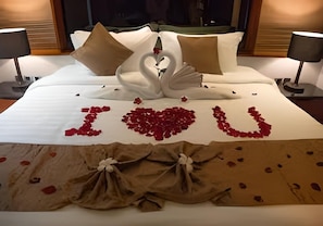 Premium bedding, down duvets, in-room safe, desk