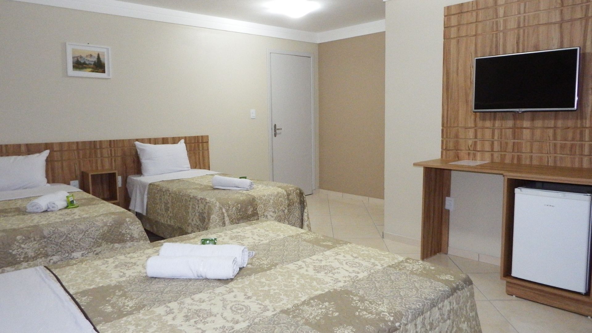 economy quadruple room, multiple beds, non smoking | minibar, individually furnished, desk, free wifi