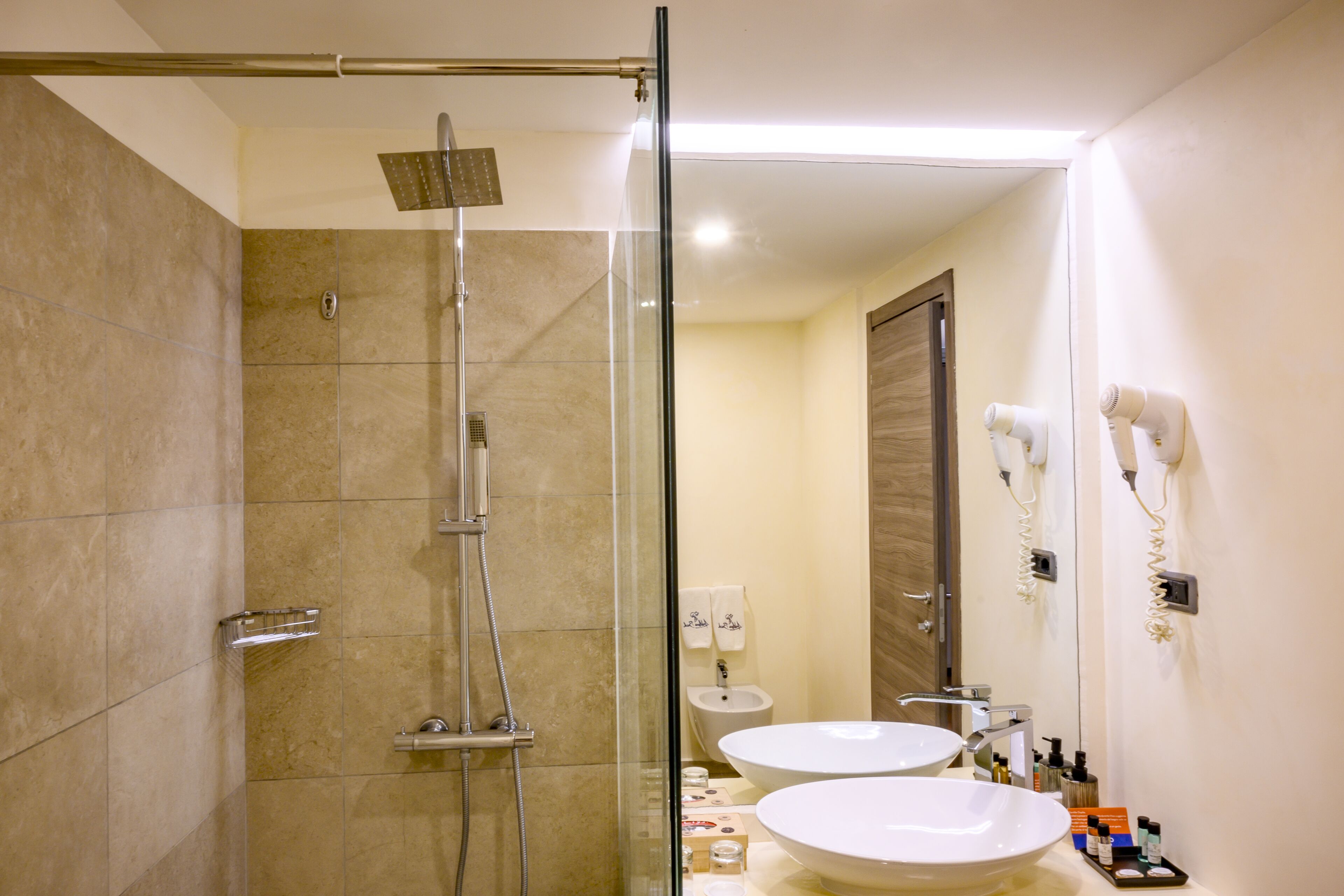 shower, rainfall showerhead, eco-friendly toiletries, hair dryer