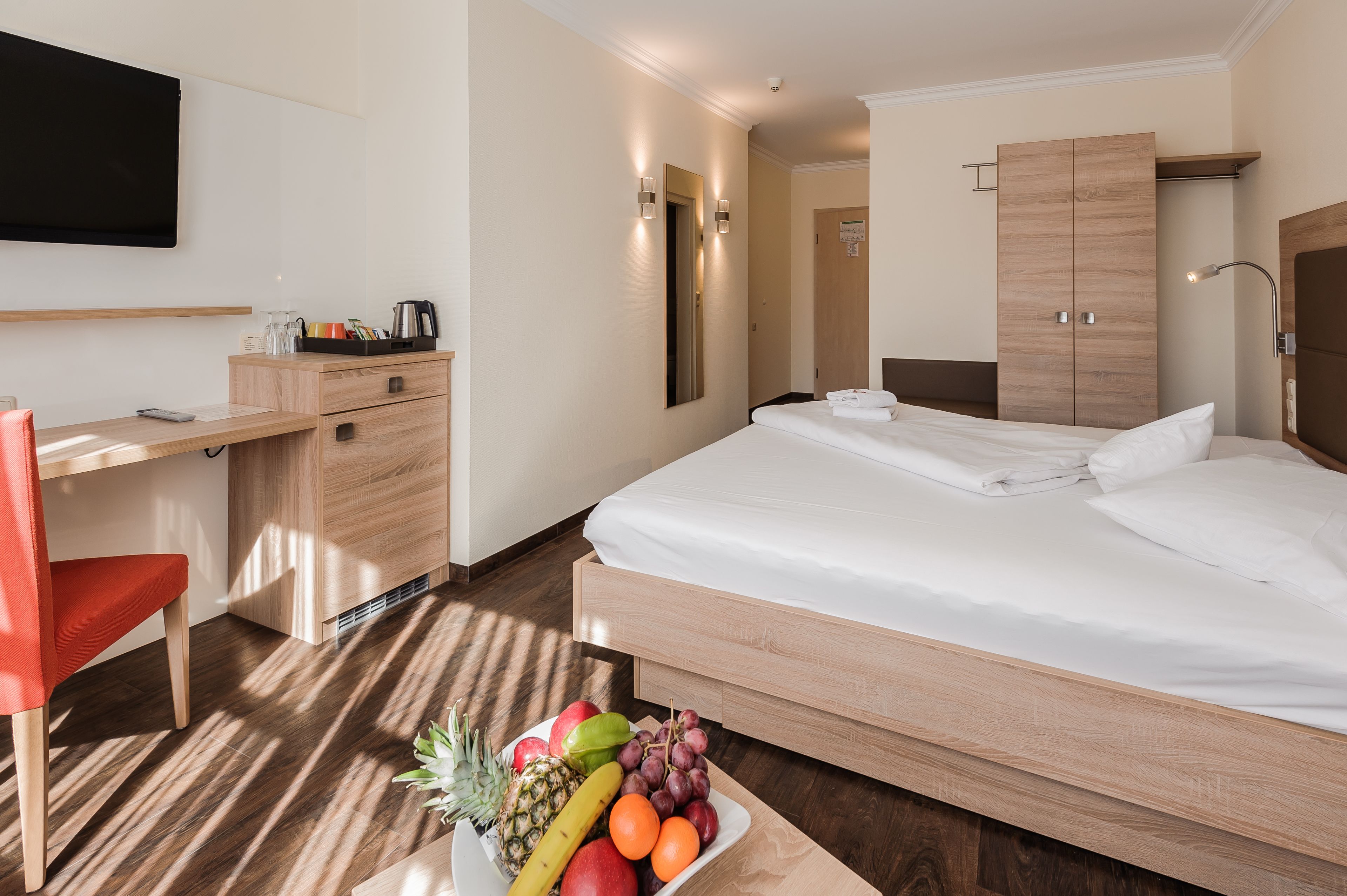 Hypoallergeen beddengoed, een minibar, een kluis op de kamer, een bureau