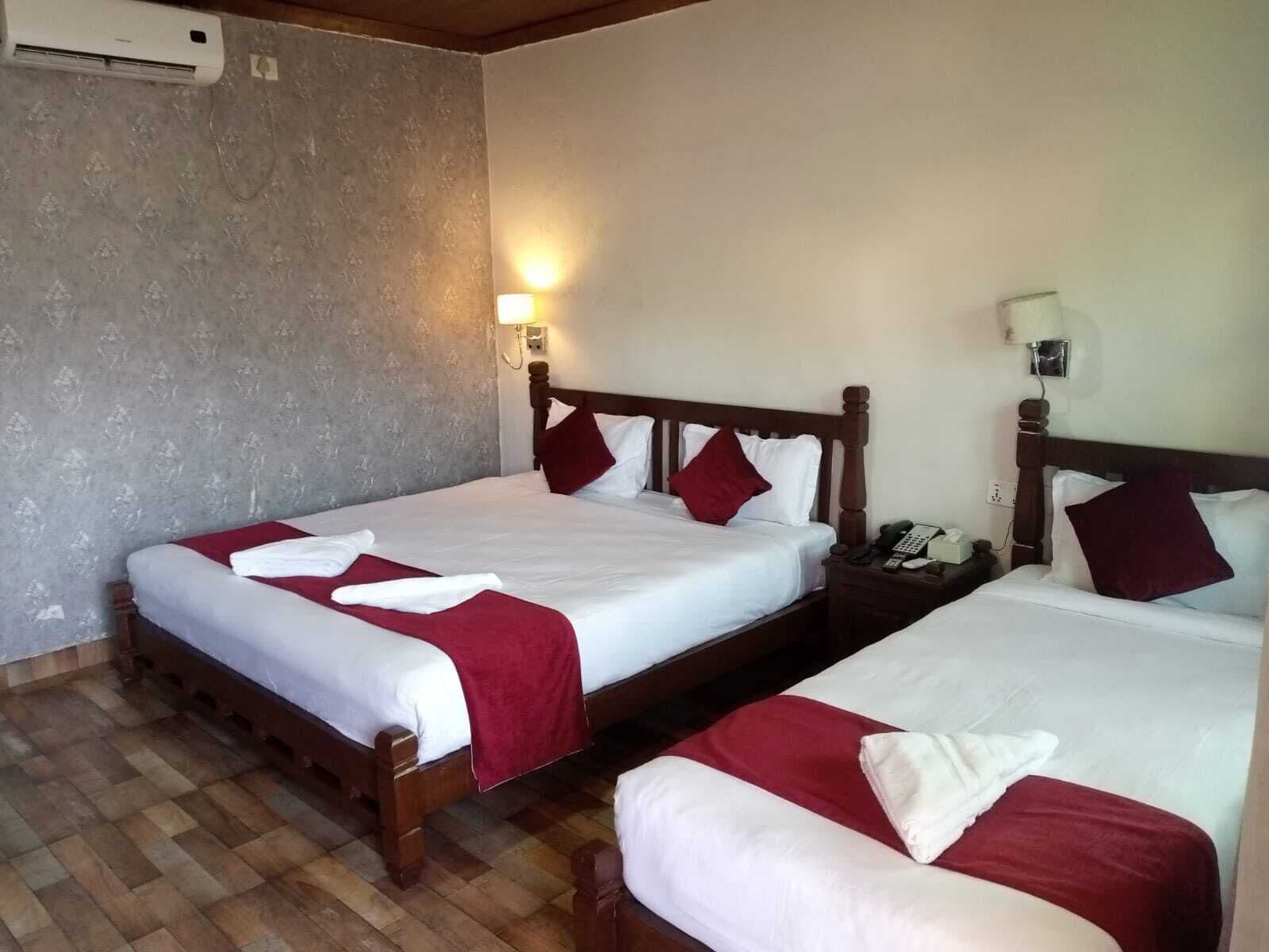 Deluxe Triple Room | 1 bedroom, minibar, desk, free WiFi