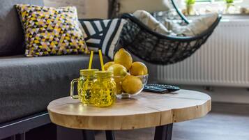 Deluxe Apartment | Living area | 40-inch Smart TV with digital channels, TV