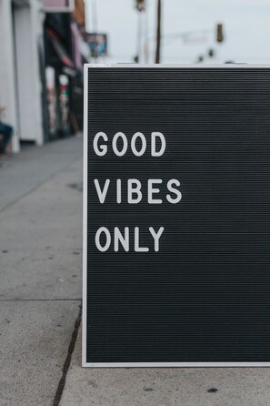 A sign with the text "GOOD VIBES ONLY" on a black background. - Carnately Lodge Ballycastle (Ballycastle)