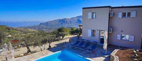 Seasonal outdoor pool, pool umbrellas, sun loungers