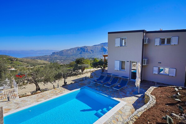 Seasonal outdoor pool, pool umbrellas, sun loungers