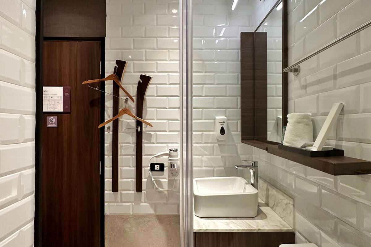 shower, free toiletries, hair dryer, slippers