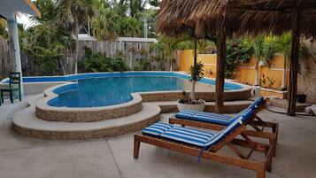 Outdoor pool, free cabanas, pool umbrellas