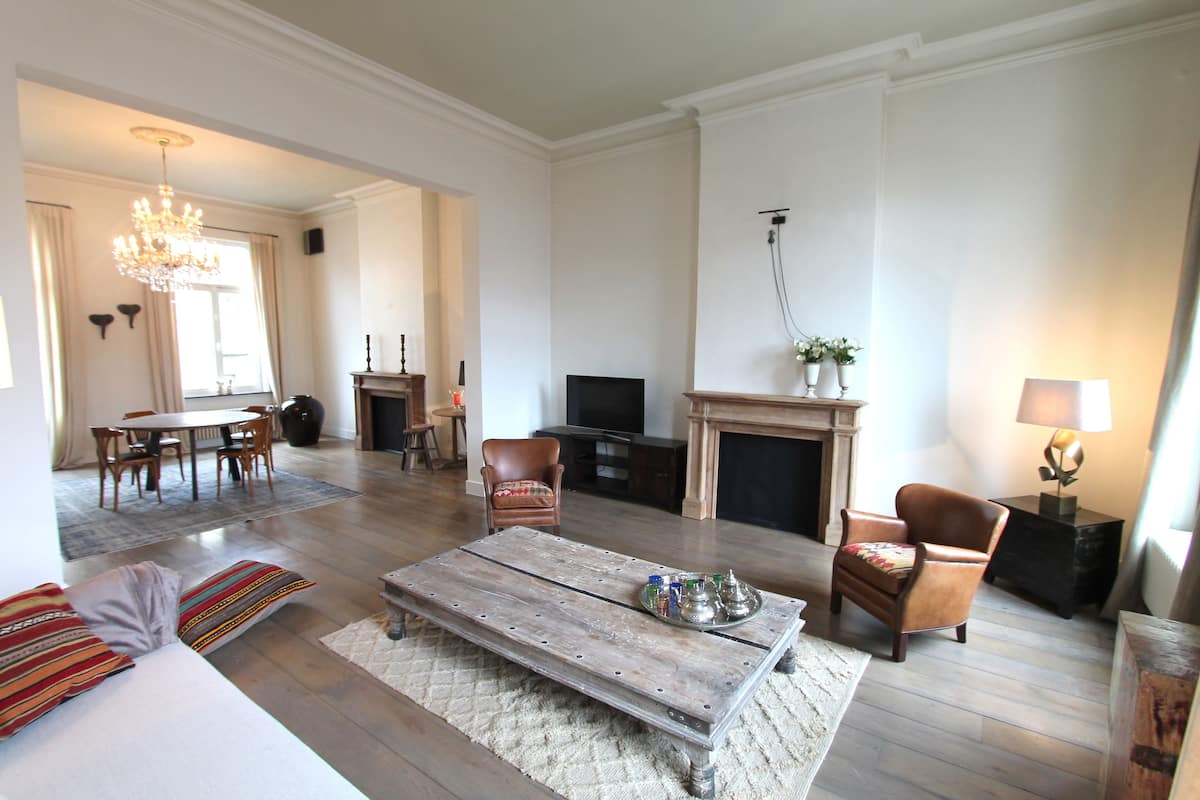 Deluxe Apartment | Living room | Flat-screen TV