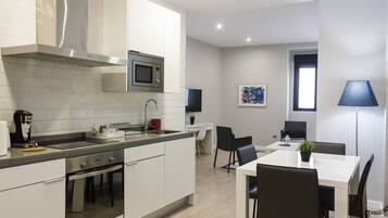 Family Apartment | Living area | Flat-screen TV