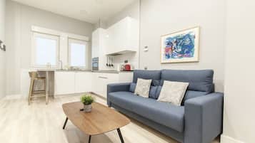 Apartamento Business | Zona de estar | Una Smart TV