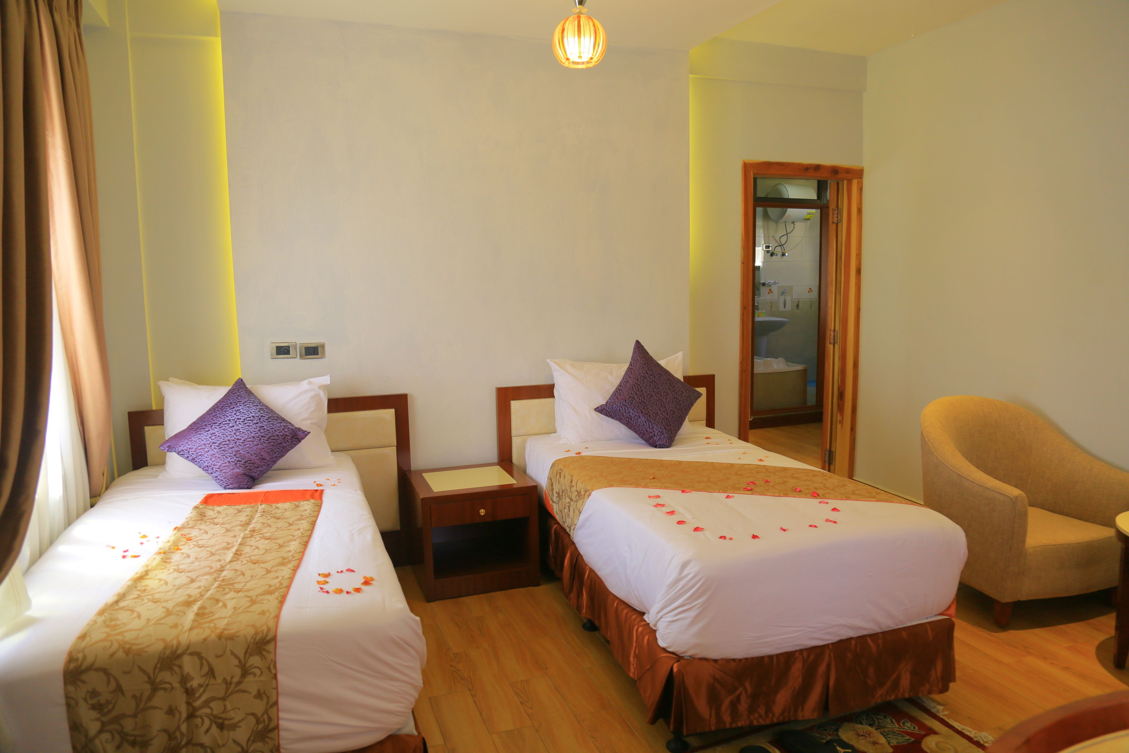 family suite, 2 bedrooms, mountain view, executive level | minibar, in-room safe, desk, iron/ironing board