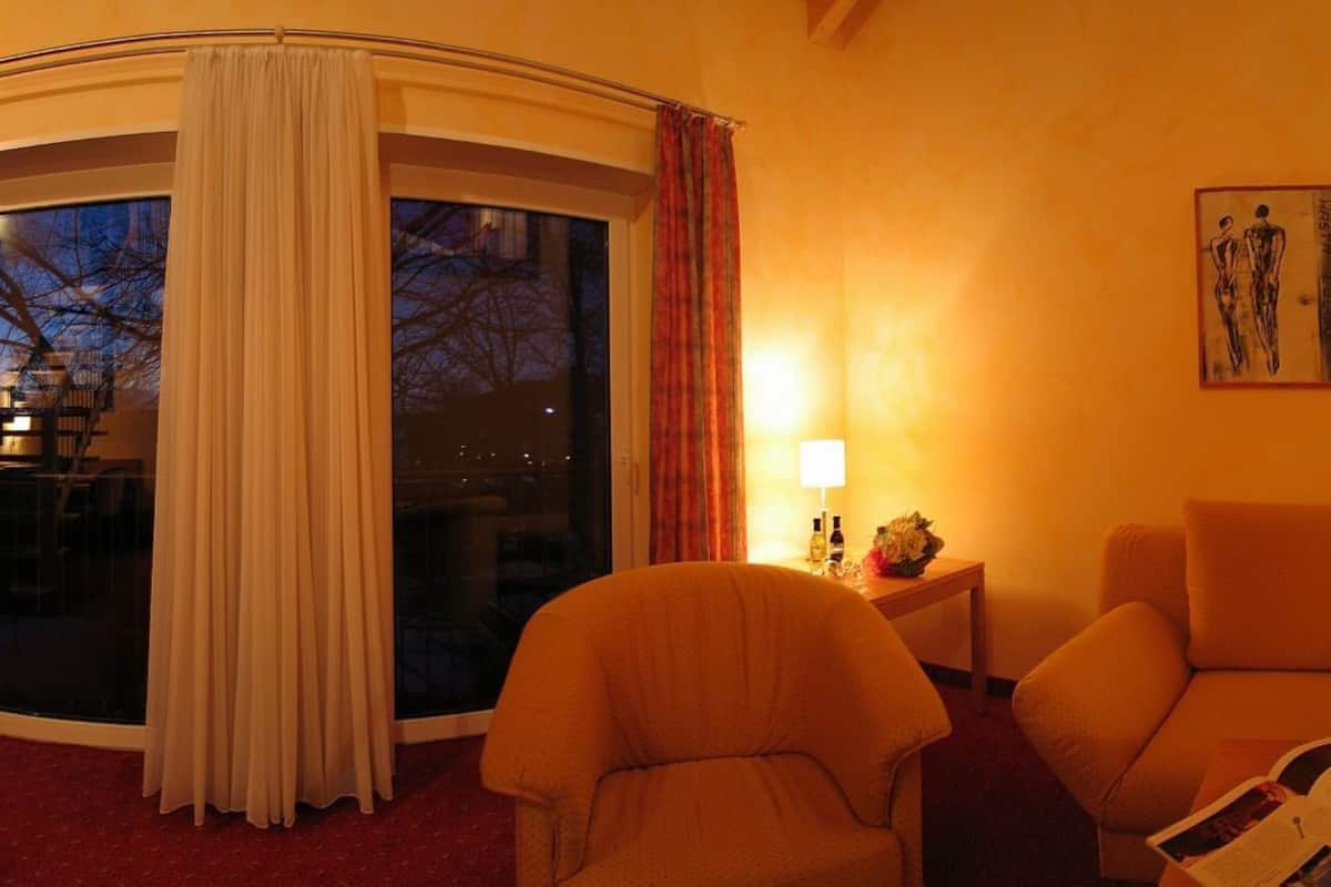 comfort suite | in-room safe, desk, blackout curtains, iron/ironing board